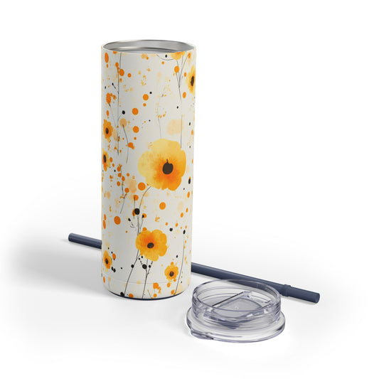 "Buttercup Skinny Tumbler with a soft yellow floral design, perfect for tea, coffee, or iced drinks. Double-wall insulated for temperature retention, ideal for travel, work, or relaxation."