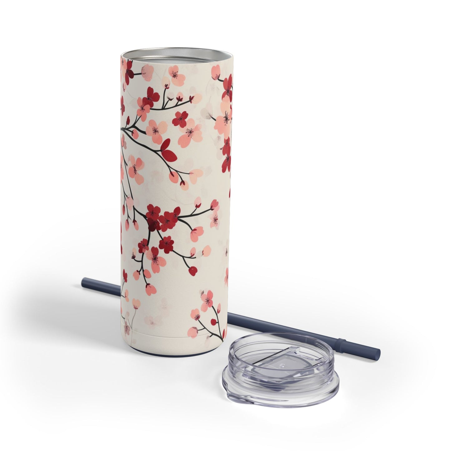 "Cherry Blossoms Skinny Tumbler with a soft pink floral design, perfect for tea, coffee, or iced drinks. Double-wall insulated for temperature retention, ideal for travel, work, or relaxation."