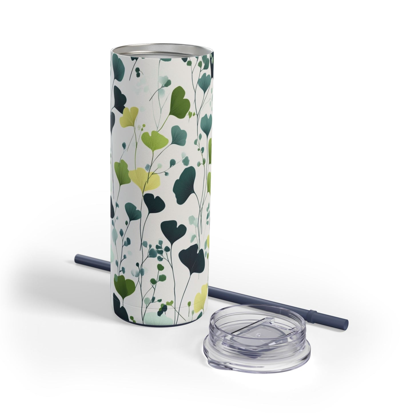 "Ginkgo Skinny Tumbler with a soft green floral design, perfect for tea, coffee, or iced drinks. Double-wall insulated for temperature retention, ideal for travel, work, or relaxation."