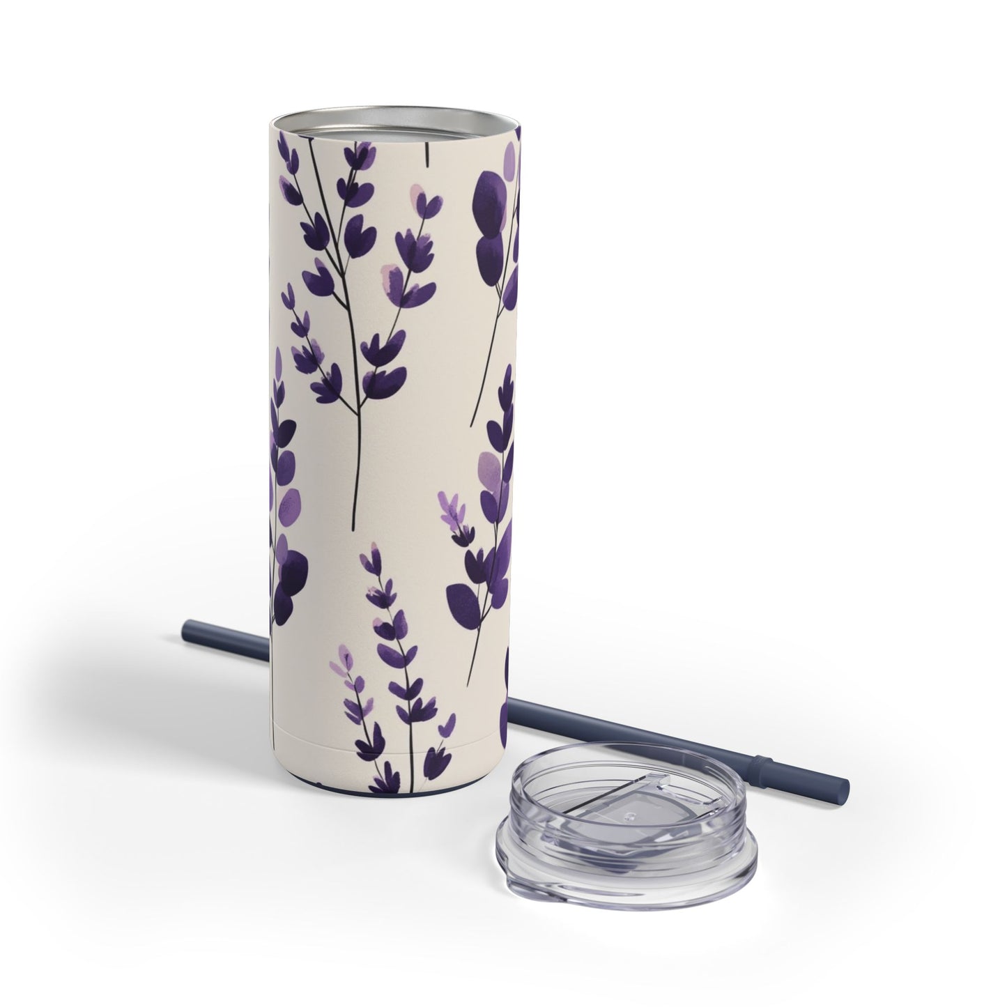 "Lavender Skinny Tumbler with a soft purple floral design, perfect for tea, coffee, or iced drinks. Double-wall insulated for temperature retention, ideal for travel, work, or relaxation."