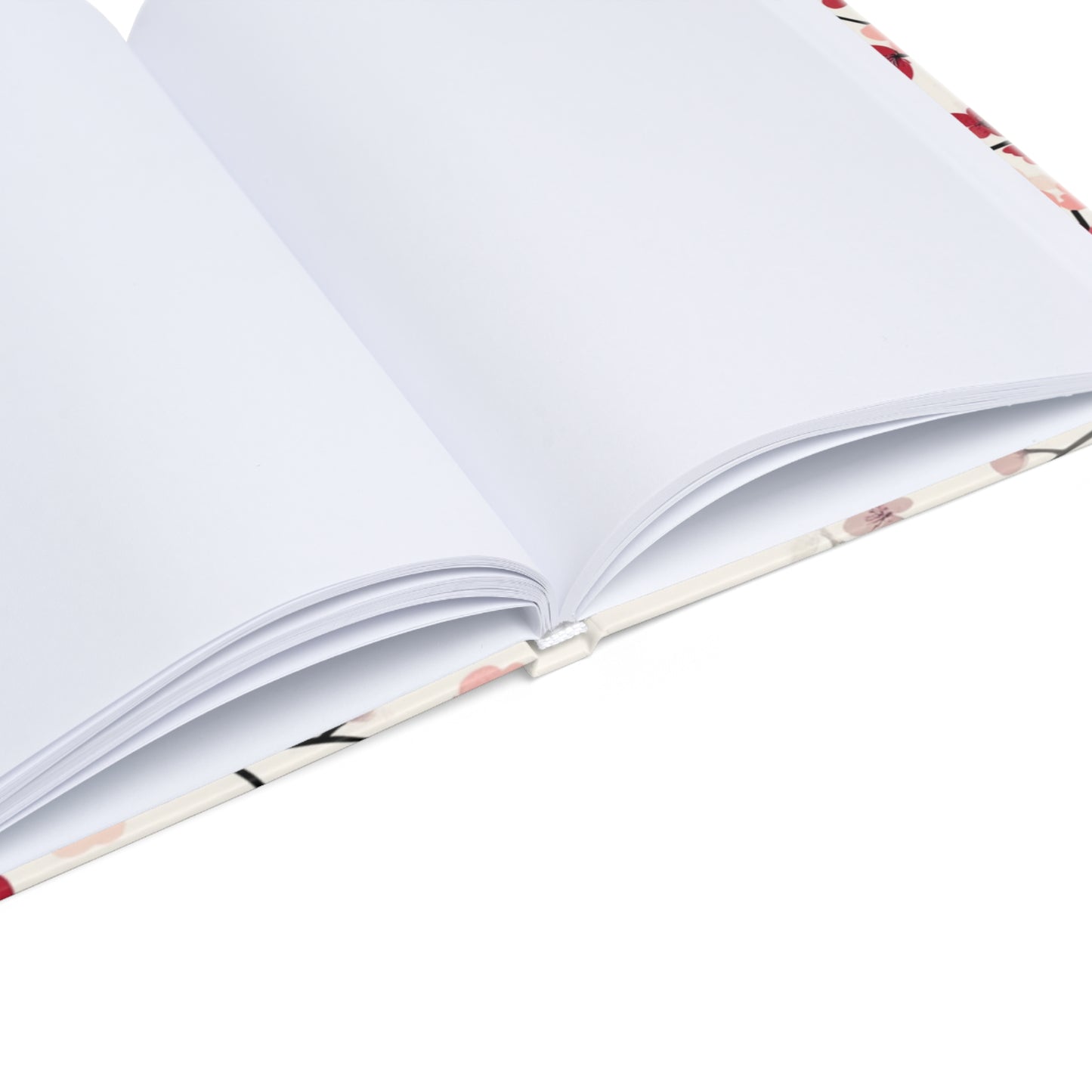 "Floral hardcover notebook with blank pages, ideal for sketching, bullet journaling, and freeform creativity. Smooth, high-quality paper."