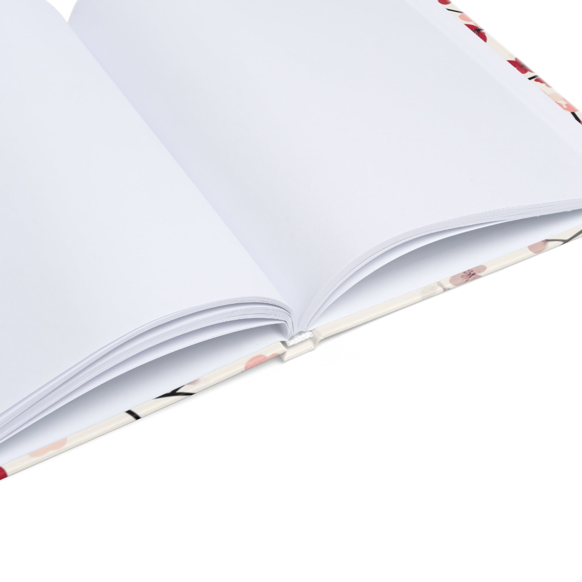 "Floral hardcover notebook with blank pages, ideal for sketching, bullet journaling, and freeform creativity. Smooth, high-quality paper."