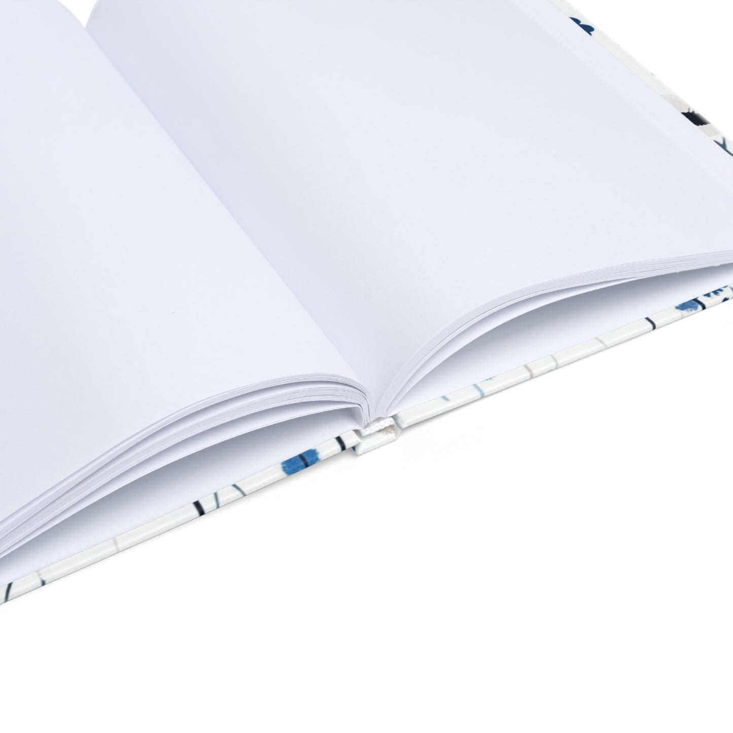 "Floral hardcover notebook with blank pages, ideal for sketching, bullet journaling, and freeform creativity. Smooth, high-quality paper."