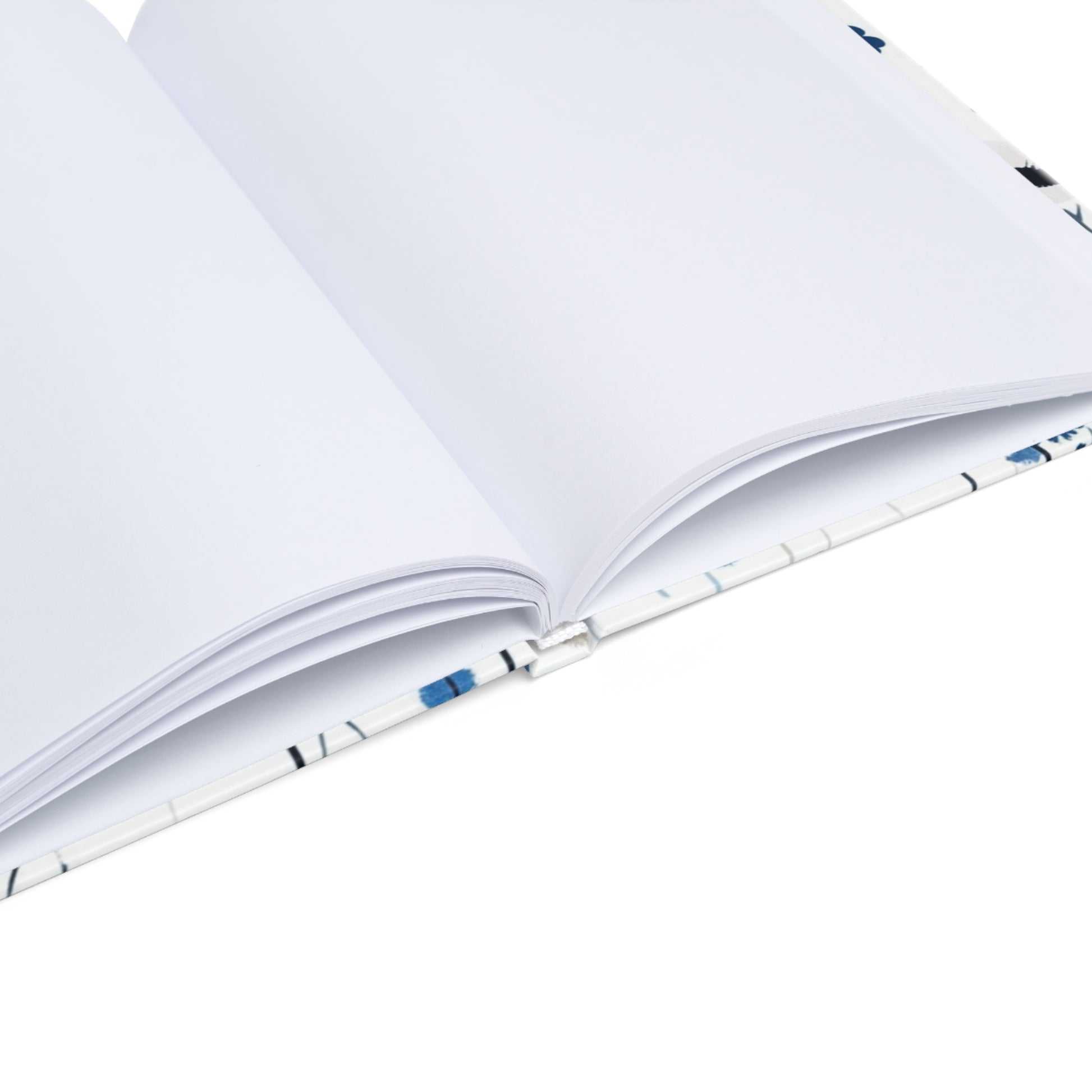 "Floral hardcover notebook with blank pages, ideal for sketching, bullet journaling, and freeform creativity. Smooth, high-quality paper."