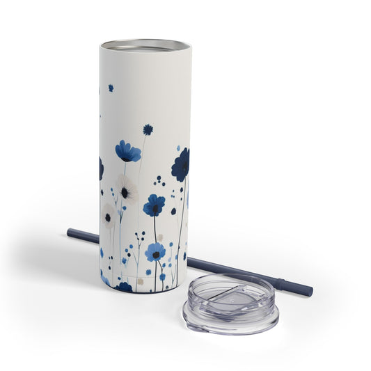 "Cornflower Skinny Tumbler with a soft blue floral design, perfect for tea, coffee, or iced drinks. Double-wall insulated for temperature retention, ideal for travel, work, or relaxation."