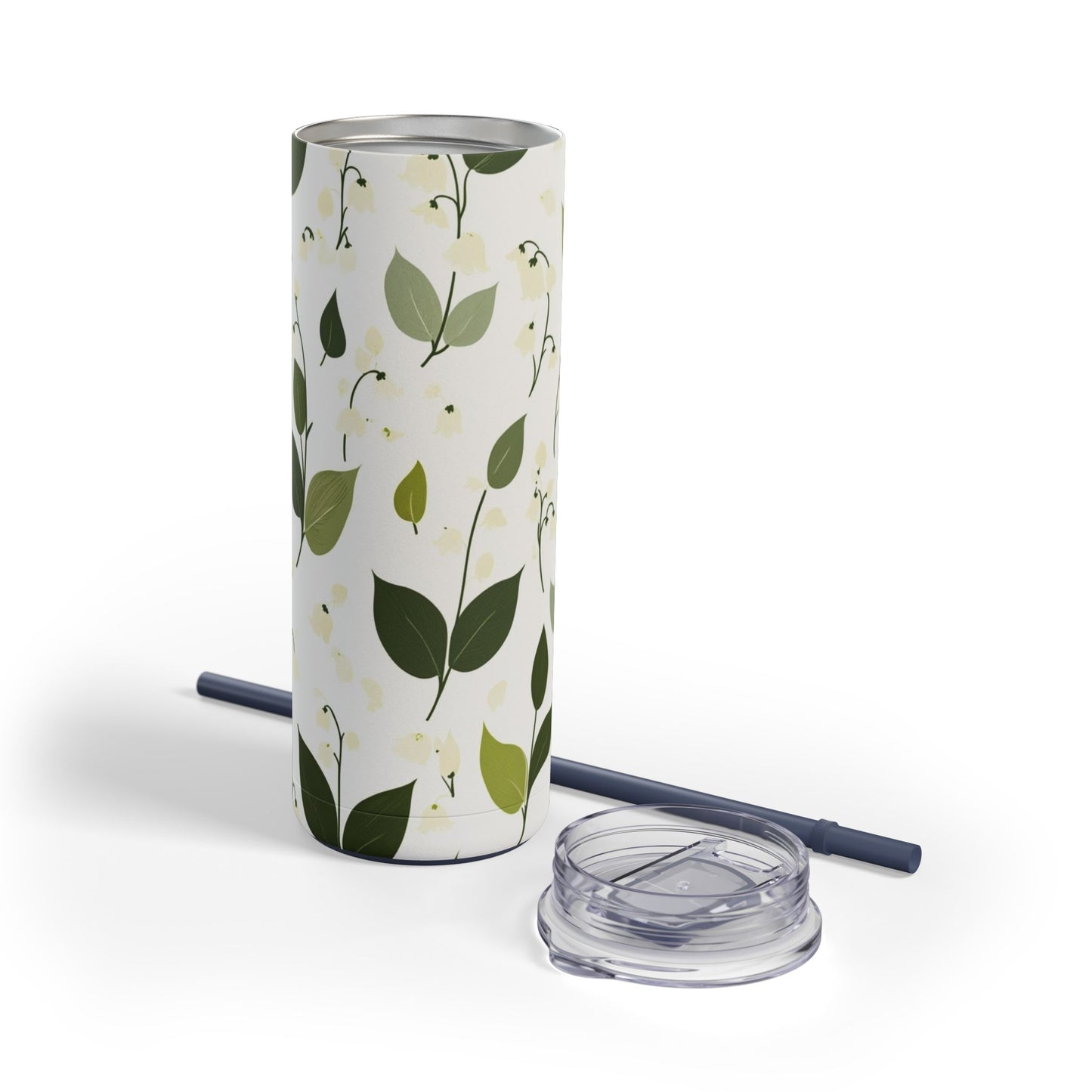 "Lily of the Valley Skinny Tumbler with a soft green floral design, perfect for tea, coffee, or iced drinks. Double-wall insulated for temperature retention, ideal for travel, work, or relaxation."