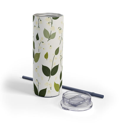 "Lily of the Valley Skinny Tumbler with a soft green floral design, perfect for tea, coffee, or iced drinks. Double-wall insulated for temperature retention, ideal for travel, work, or relaxation."