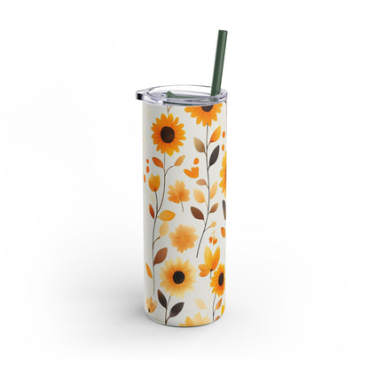"Sunflower Skinny Tumbler with a slim, ergonomic design and a seamless floral print. Fits comfortably in hand and cup holders."